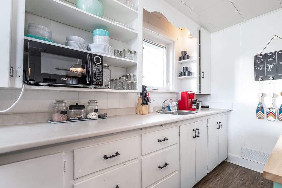 Fully stocked kitchen, fridge, stove, cutlery, plates etc 
