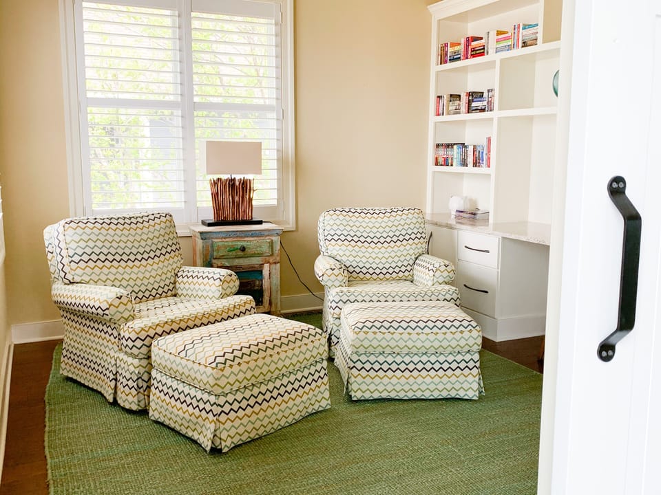 Office/Library with sliding barn door for privacy.