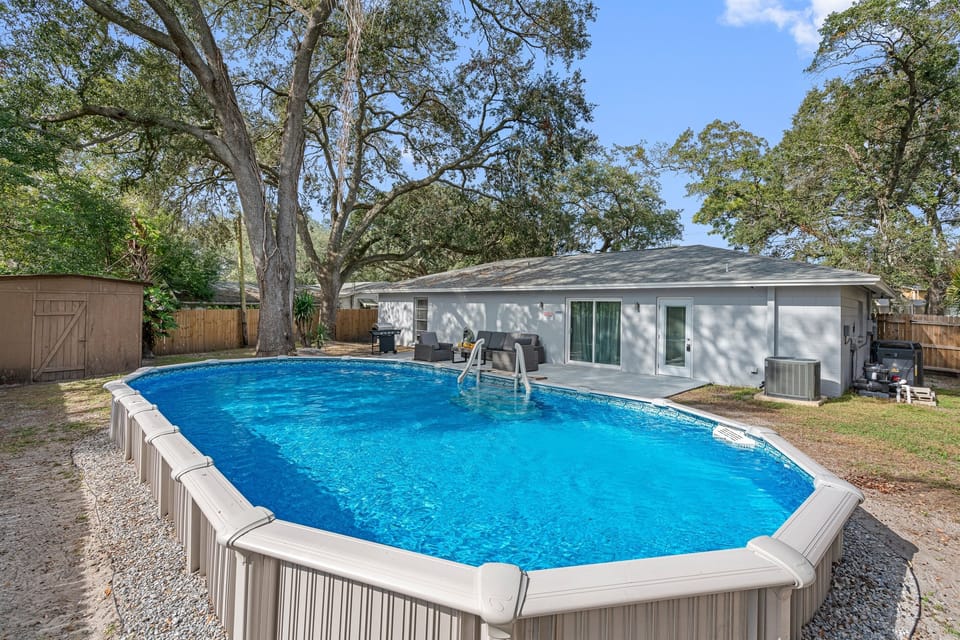 Immaculate heated pool, beautiful trees and a grill you could use while creating wonderful memories with your family and friends in a fully fenced backyard. If you love what you see, send us an inquiry now!