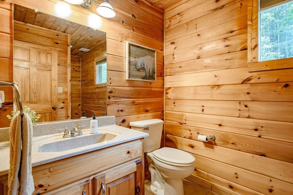 Upstairs bathroom with bathtub.