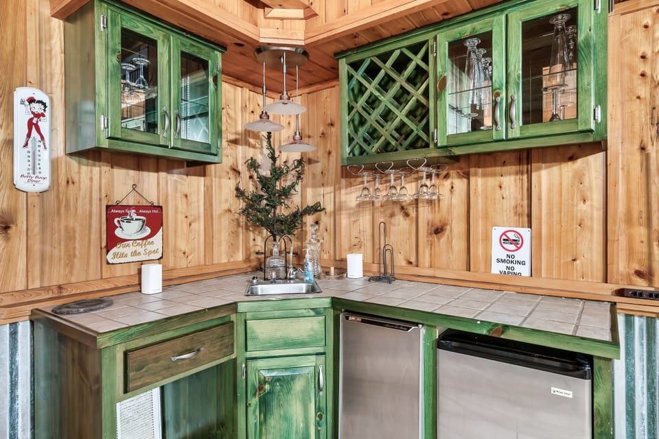 Make yourself a drink in the downstairs wet bar.