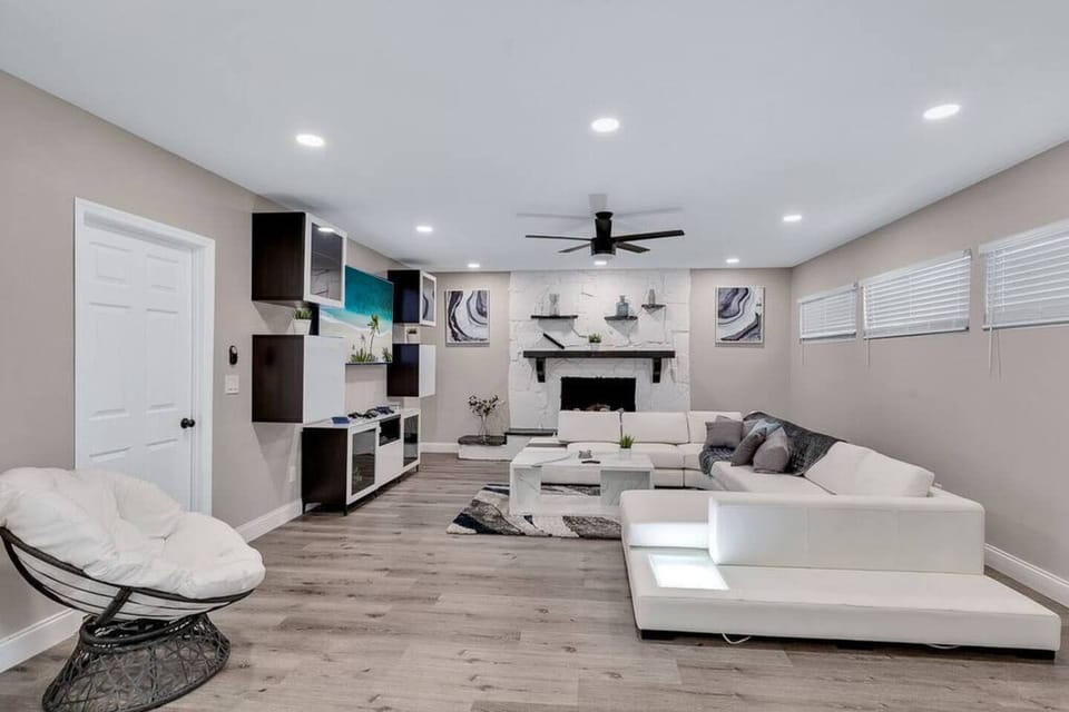 Relax and have an amazing time in this elegant living area with an L-shape couch while watching your favorite show! 