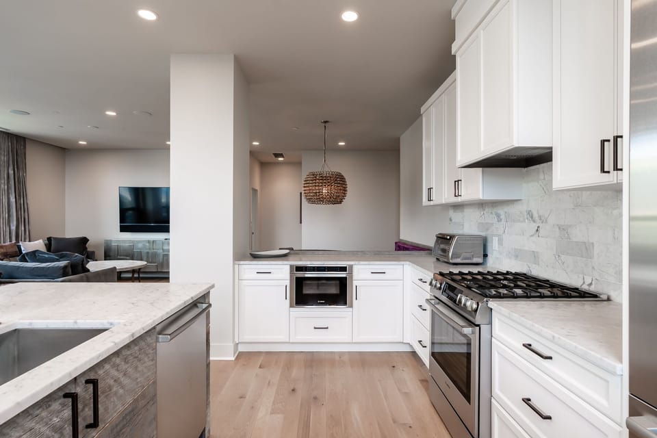 Large open concept living room, kitchen and dining room.