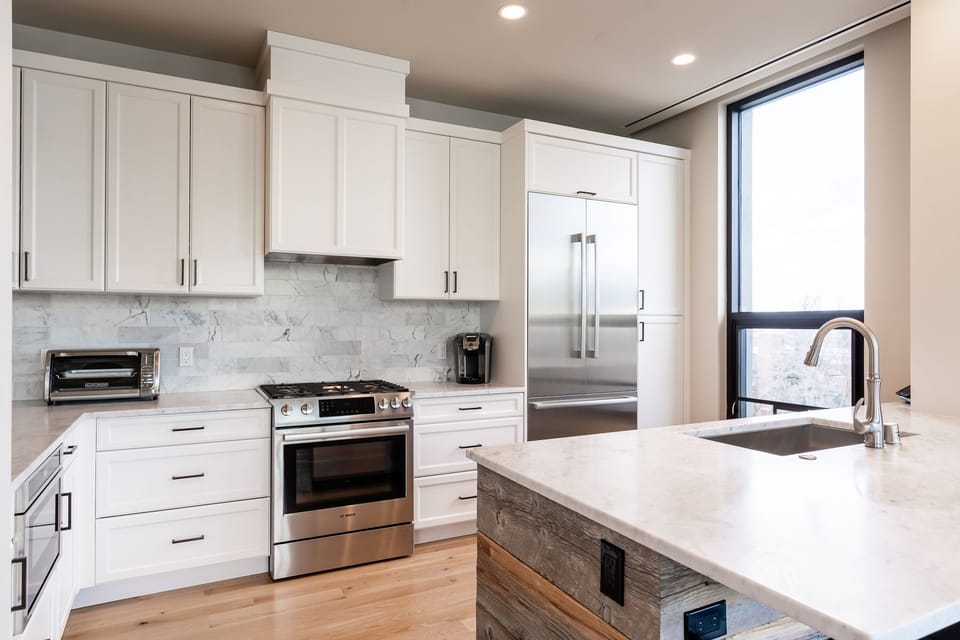 Full kitchen with a Keurig coffee maker.