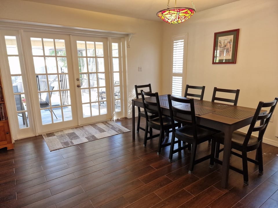 Spacious dining area with seating for eight with removable leaf