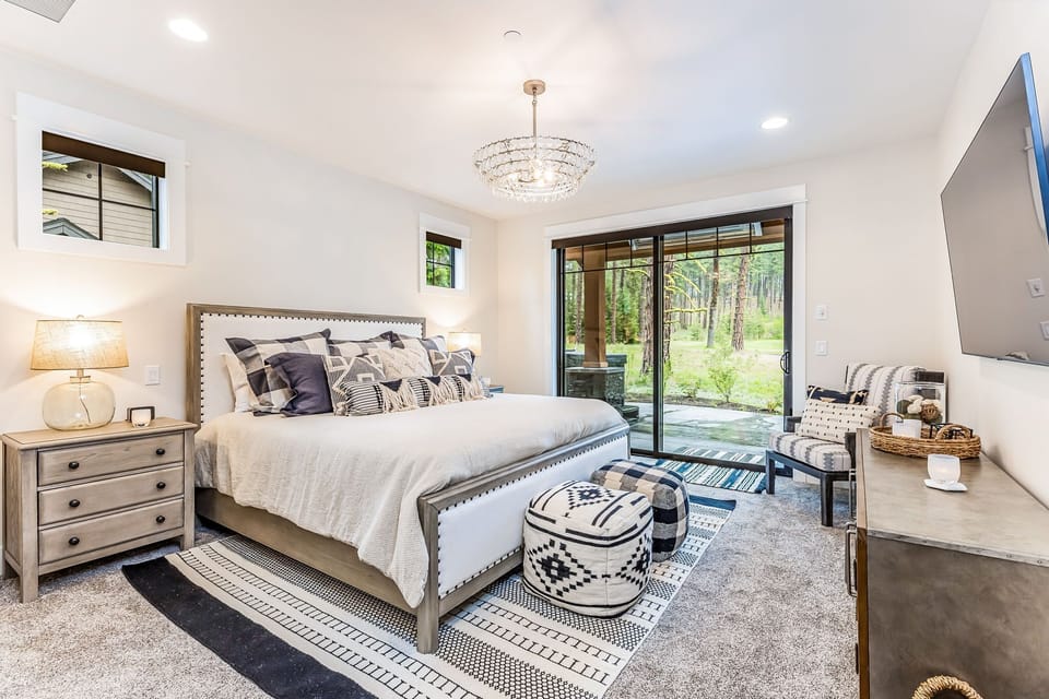Master Bedroom with gorgeous views looking out to hole 13 and modern furnishings