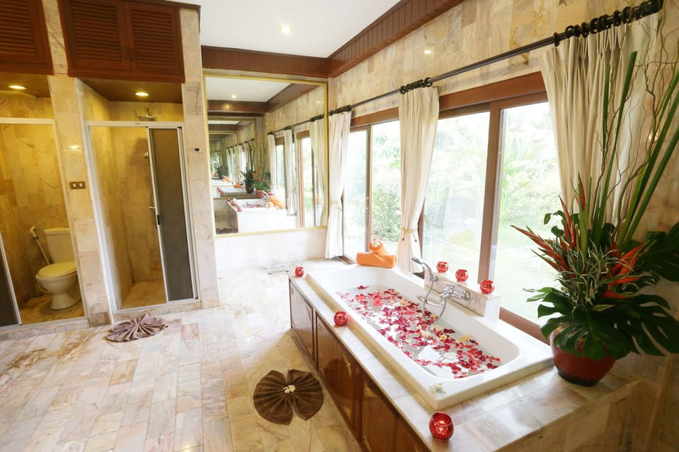 Seaview Villa | Bathroom | Separate tub and shower, hair dryer, bathrobes, slippers