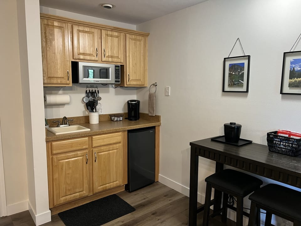Kitchenette with mini-fridge, microwave, & portable electric 2-burner
