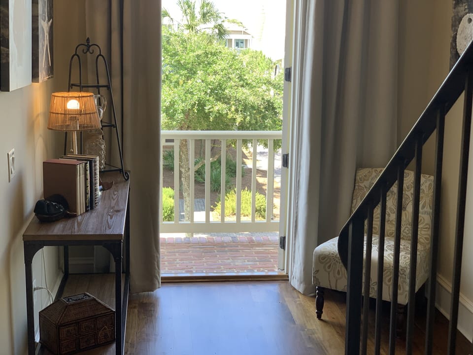 Balcony doors off hallway on second floor. 