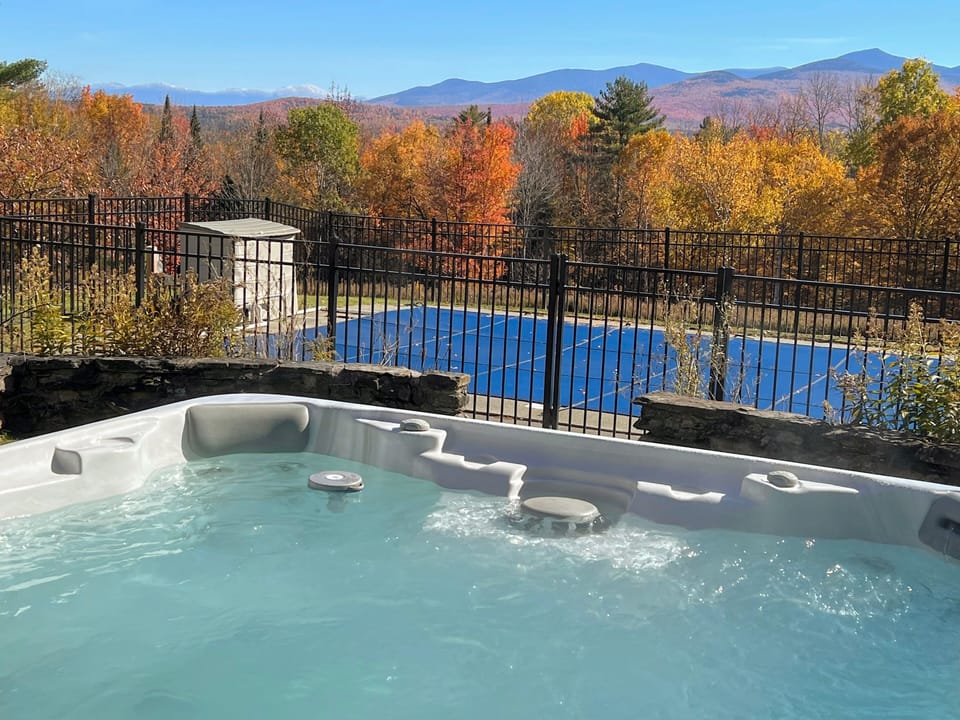 Breathtaking panoramic views of the Presidential and Kinsman Ranges, Franconia Notch, and the towering peaks of Mount Washington, Mount Lafayette, and Cannon.
