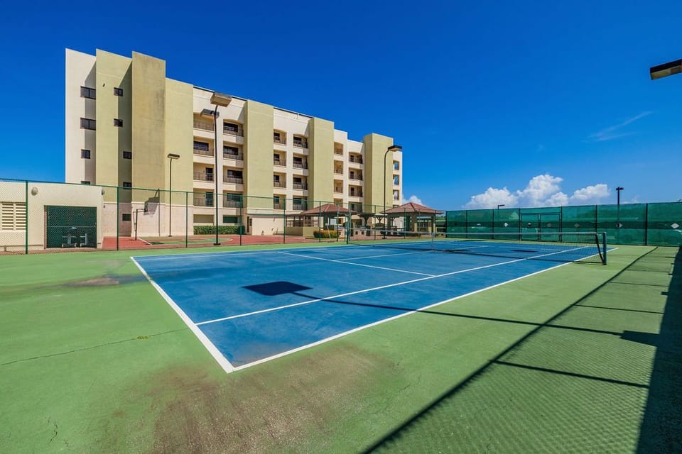 Play a game of tennis on this full sized court.
