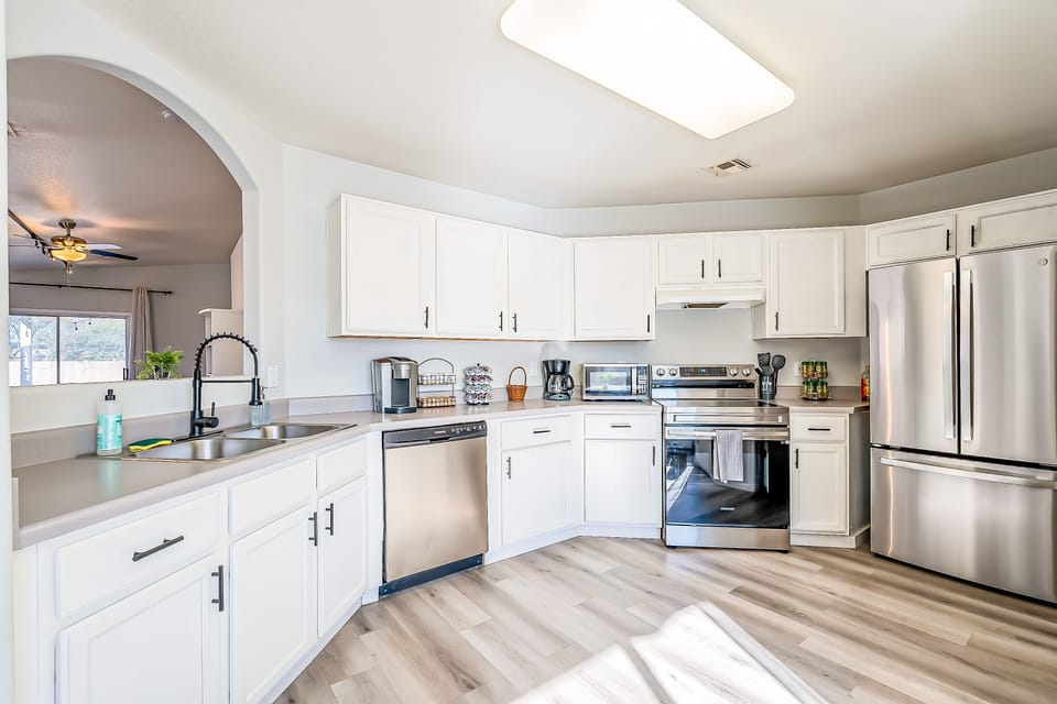 Fully stocked kitchen has everything you need to make dinner with the family.