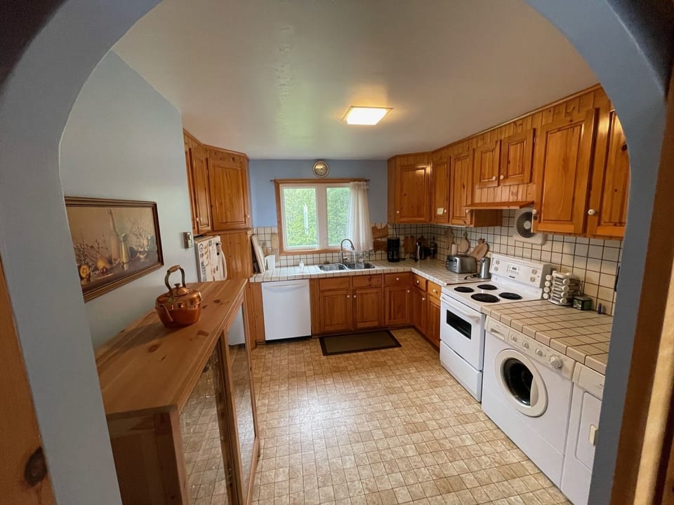 Full kitchen with washer, dryer and dishwasher 