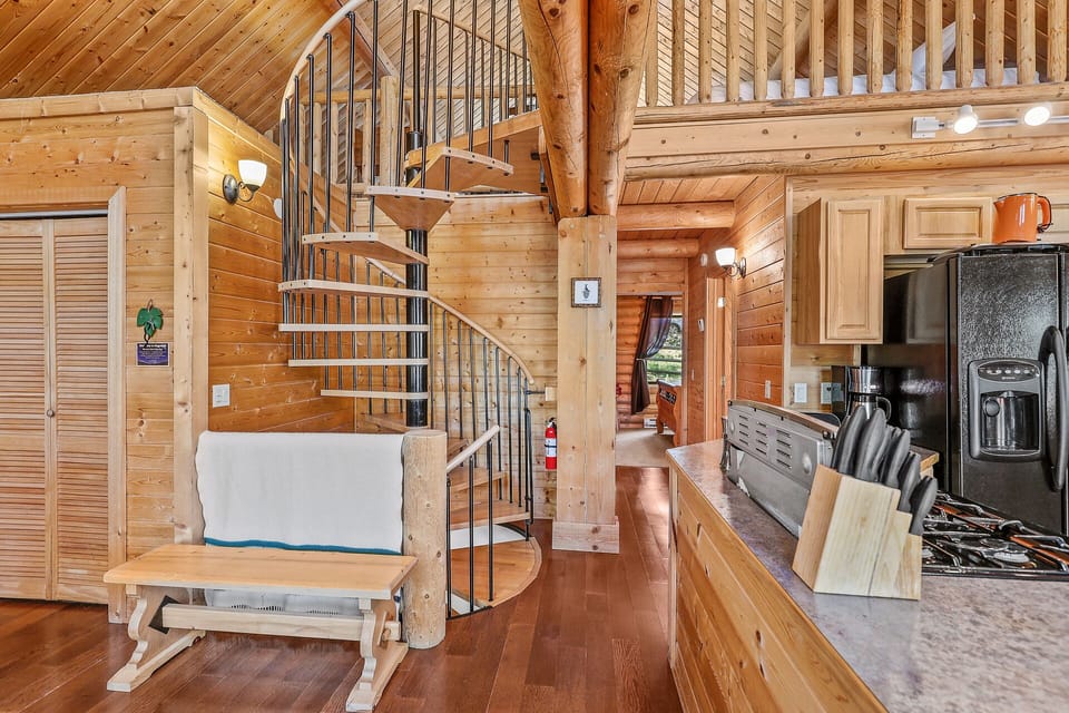 Spiral staircase leading up to the lofted 3rd bedroom or down into the game room!