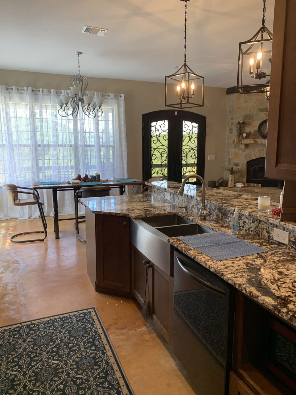 Cook meals in this beautiful kitchen w/views of the hill country.