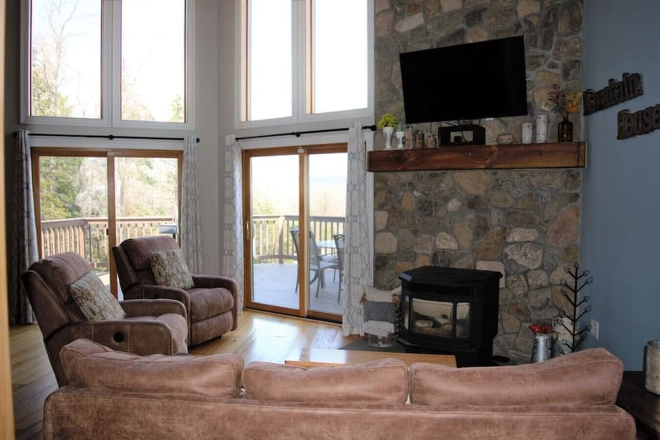 Family Room with Pellet stove to keep you warm at night! 55` TV
