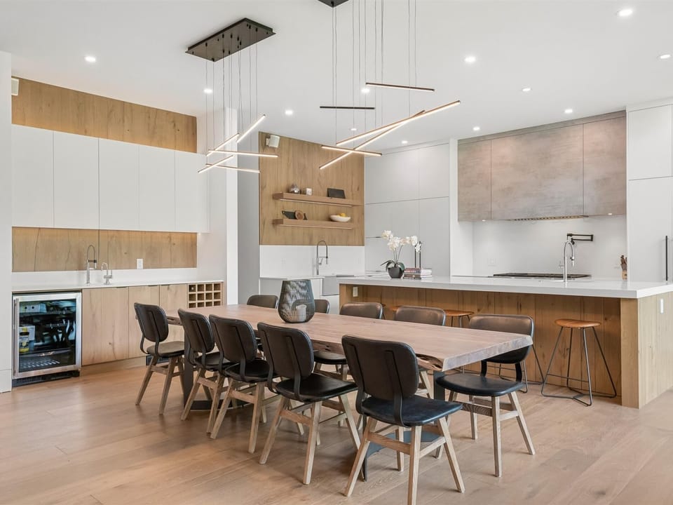 Dining for 12 plus a wet bar with wine fridge, hot water on demand, espresso and drip coffee machine
