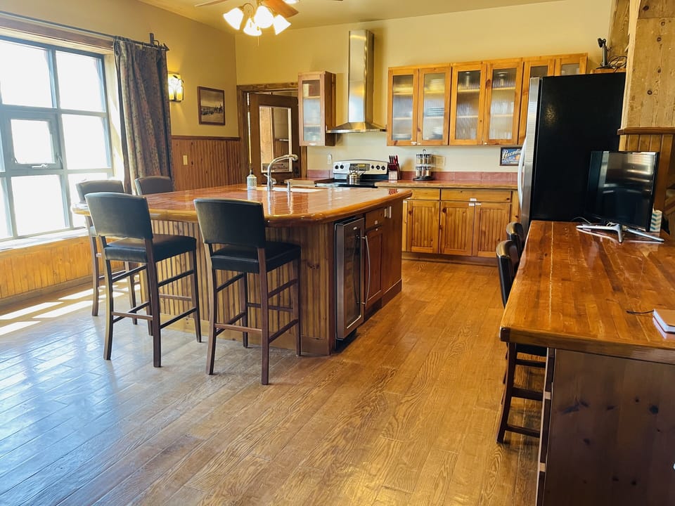 Kitchen area with island for seating