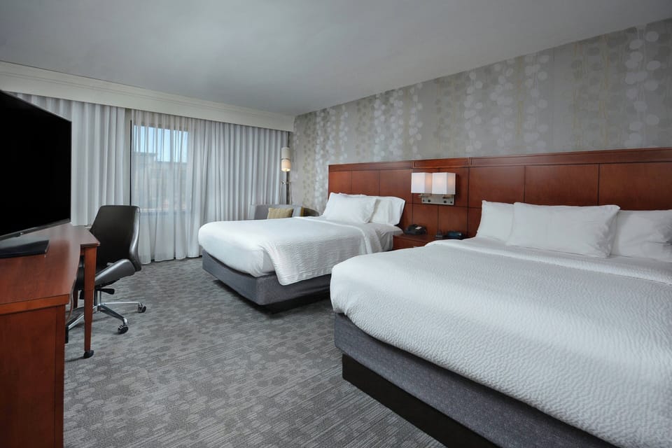 Pillowtop beds, desk, laptop workspace, iron/ironing board