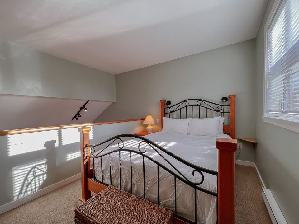 Bright room with a queen bed