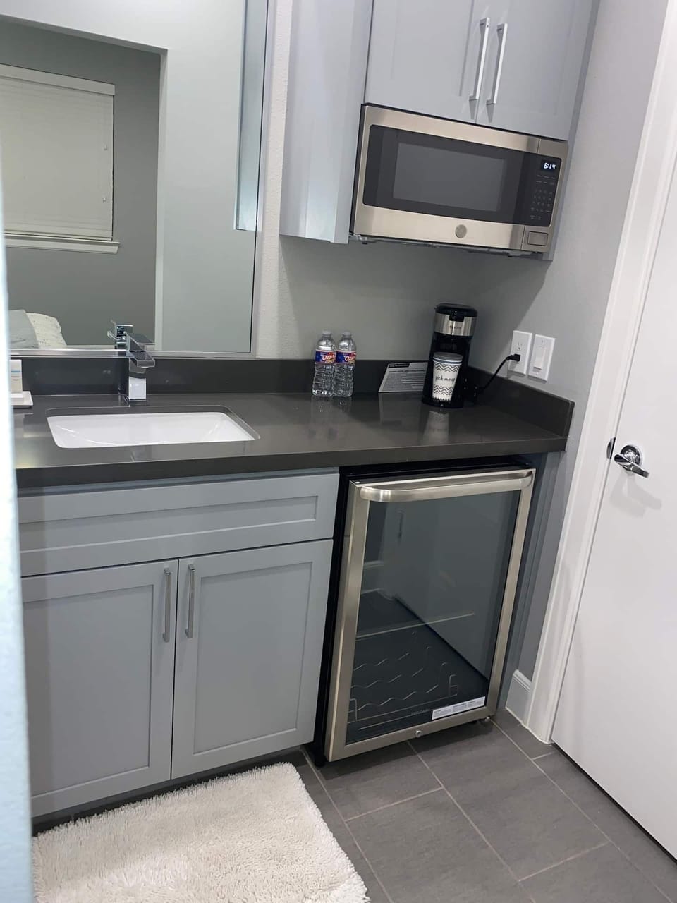 Microwave and mini fridge included