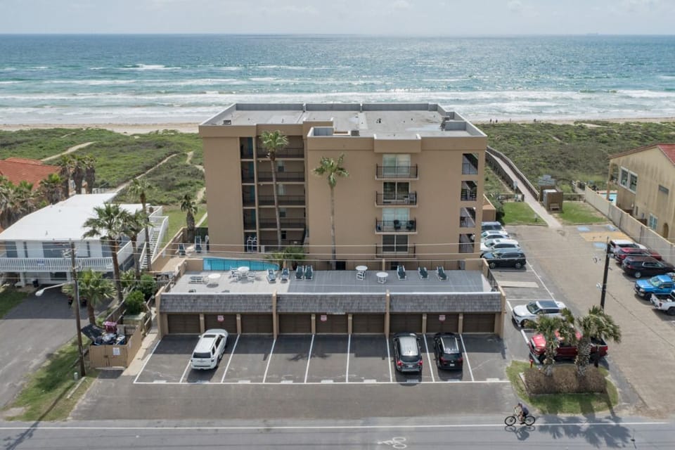 Second-floor beachfront living with direct access to the sand from Seagull Condominiums.
