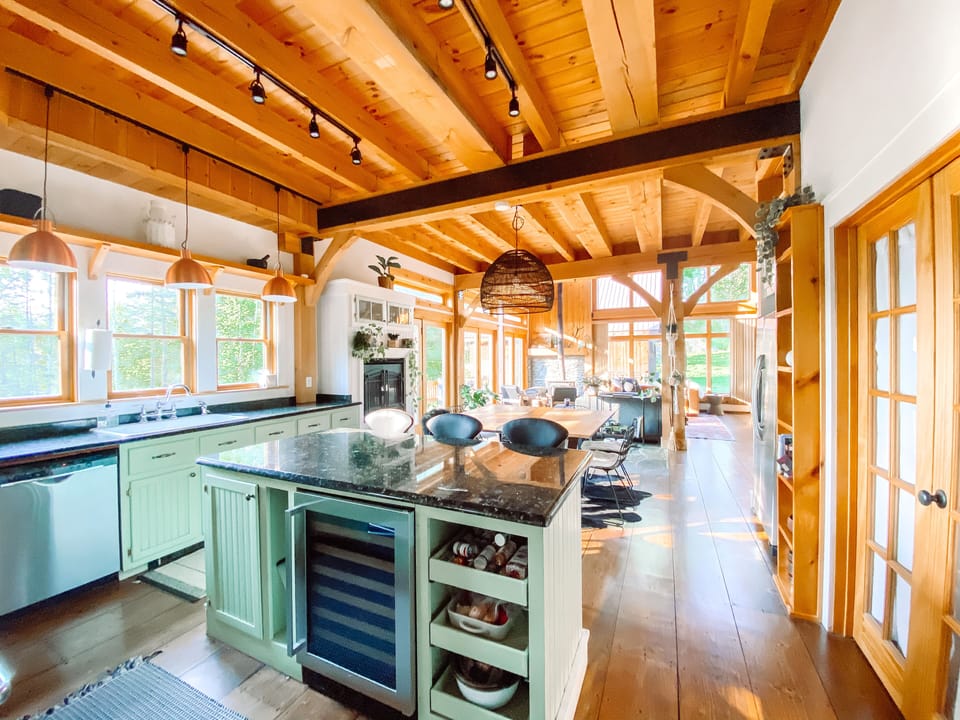 View from kitchen. Fully open with bar seating, plenty of storage, wine fridge