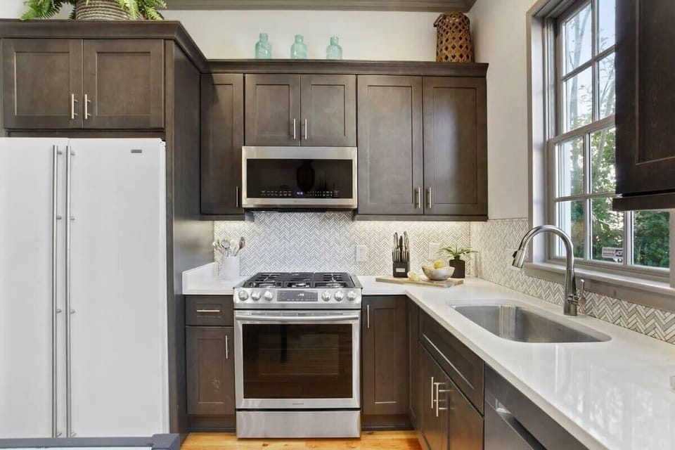 Open Concept Chef's Kitchen | Fully Stocked | Open to Dining | First Floor
