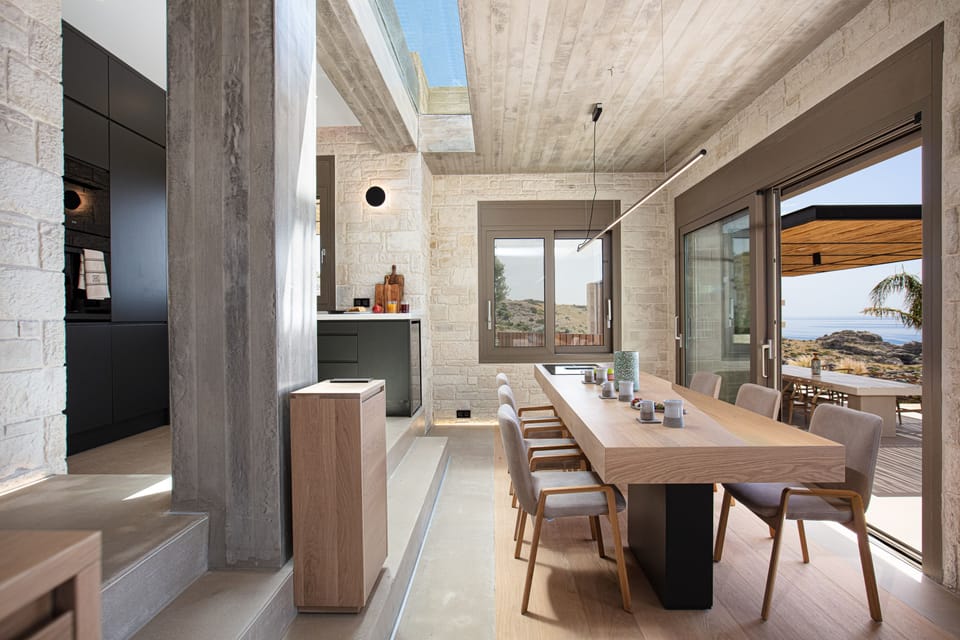 The modern kitchen is fully equipped with branded built-in appliances.