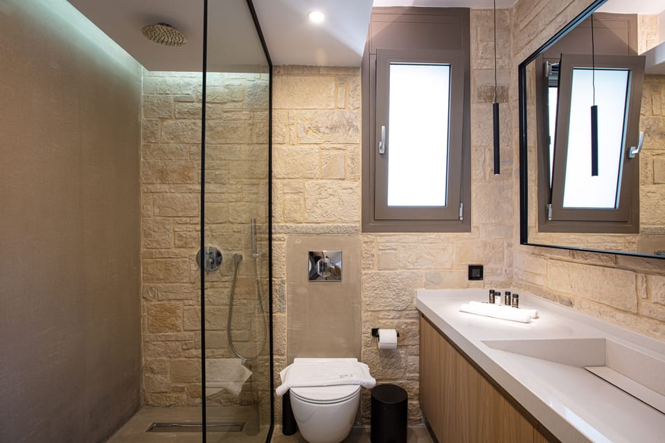 The ground floor bathroom is en-suite to the bedroom.