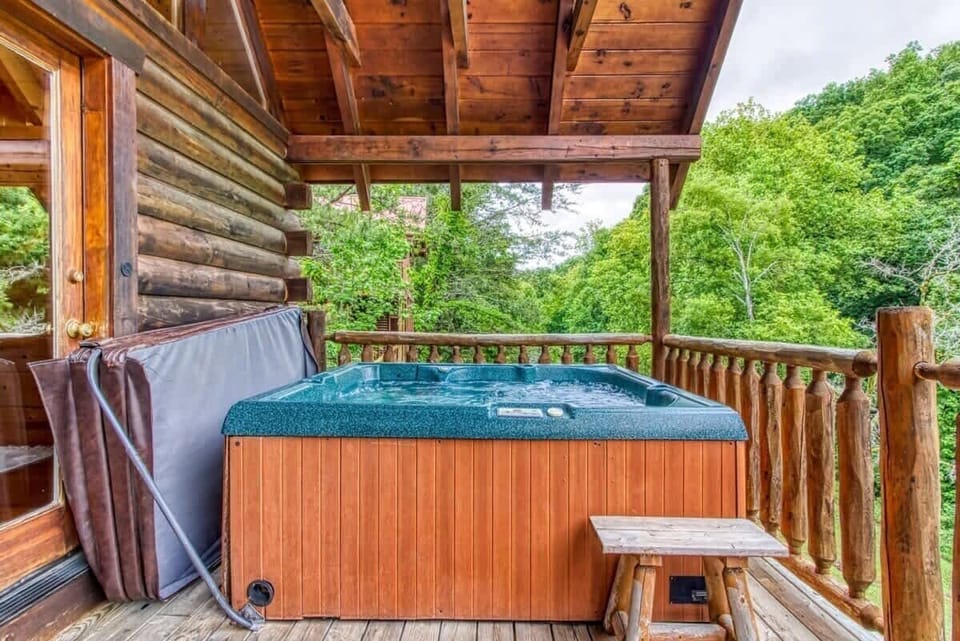 Enjoy picturesque views of the resort-style pool, just one of the many beautiful sights surrounding the cabin.