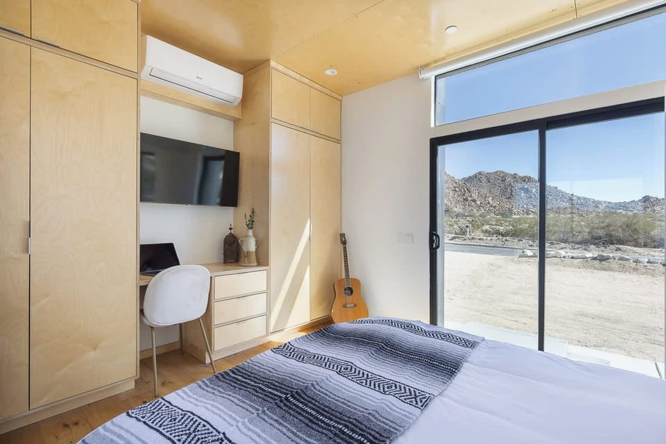 Rest well on a Premium DreamCloud mattress with built-in storage and mountain views.