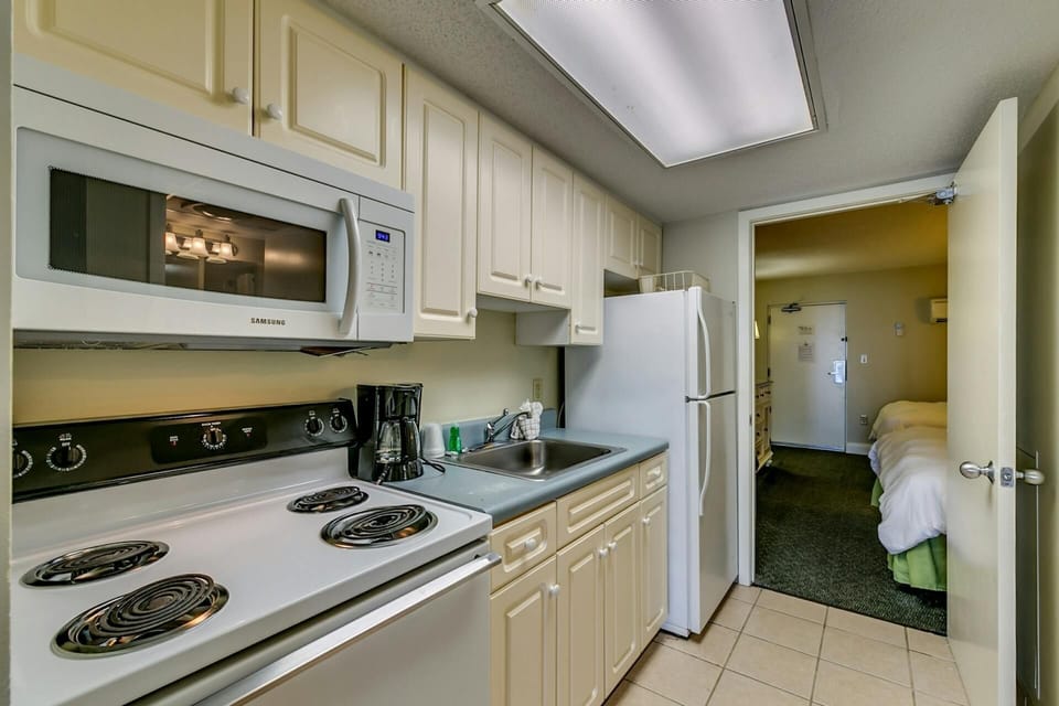 Stove, fridge and cooking utensils 