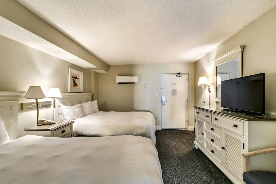 Flat screen TVs in each room 