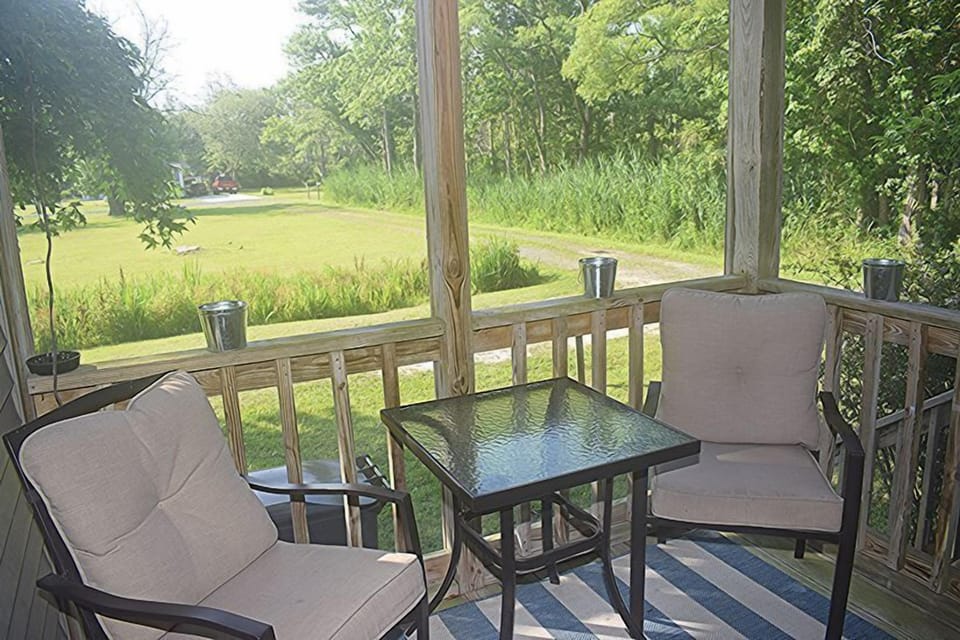 Private screened porch.