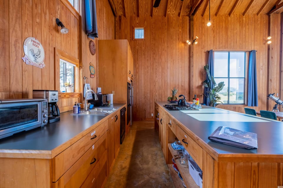 Countertop oven, coffee machine, microwave. 