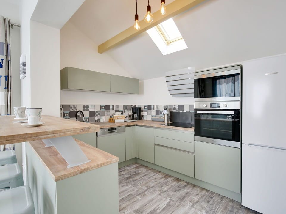 Cabinetry, Countertop, Furniture, Property, Building, Kitchen Stove, Kitchen, Kitchen Appliance, Wood, Drawer