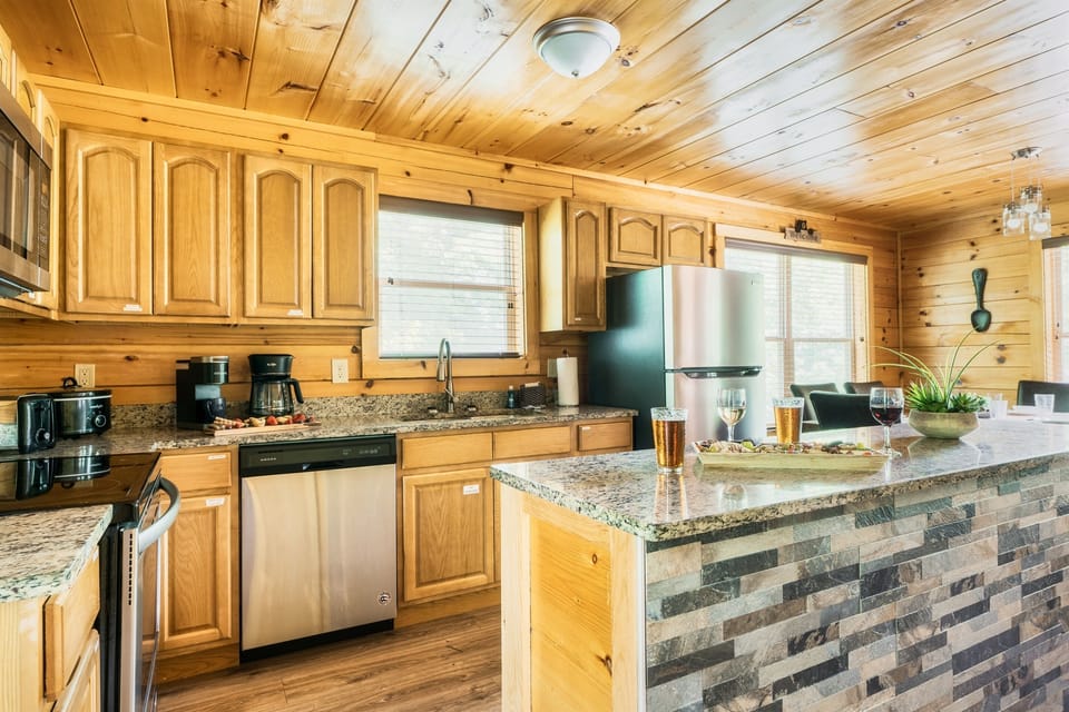 The kitchen comes conveniently stocked with a starter supply of amenities, including paper towels and dish soap.