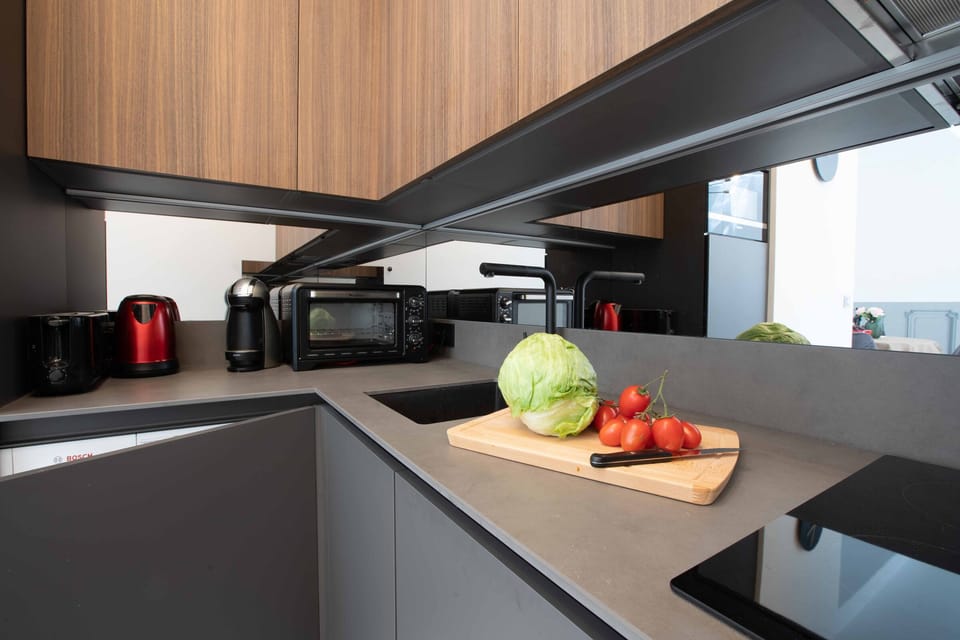 Modern Kitchen with Nespresso machine, toaster a kettle
