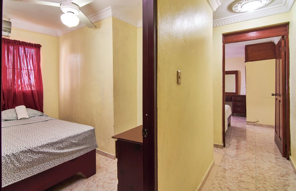 Spacious 2-bedroom Apartment With Private Terrace Near SDQ Airport Fast Wi-f Apartment in Santo Domingo Este