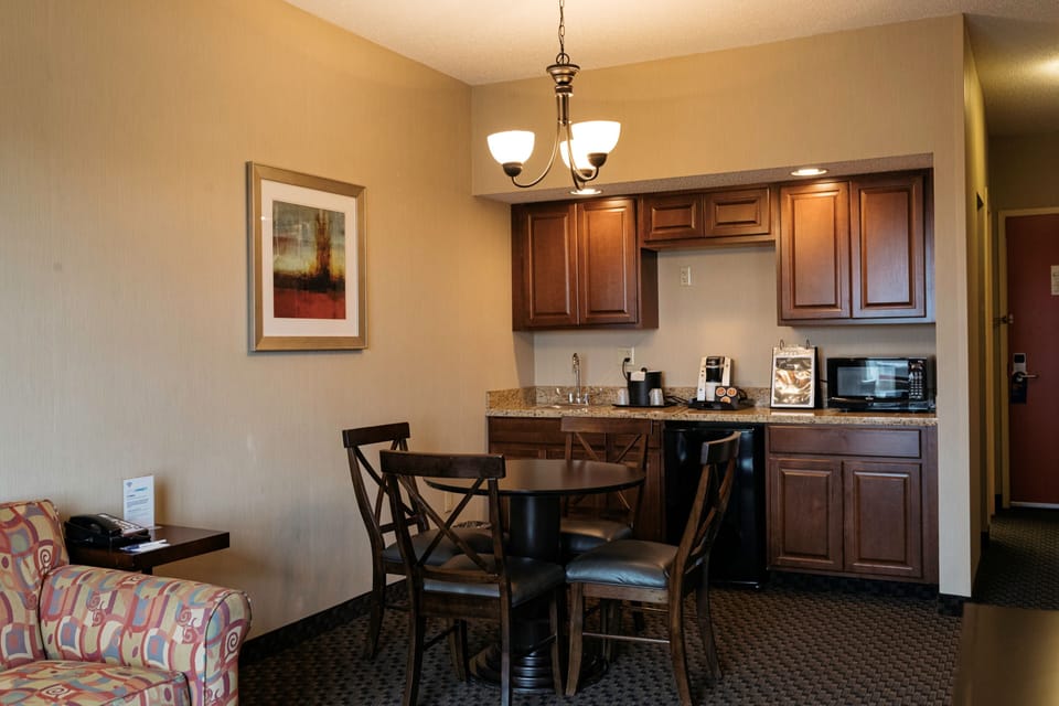 Suite, 1 Bedroom (Living Dining) | Desk, iron/ironing board, WiFi (free), alarm clocks