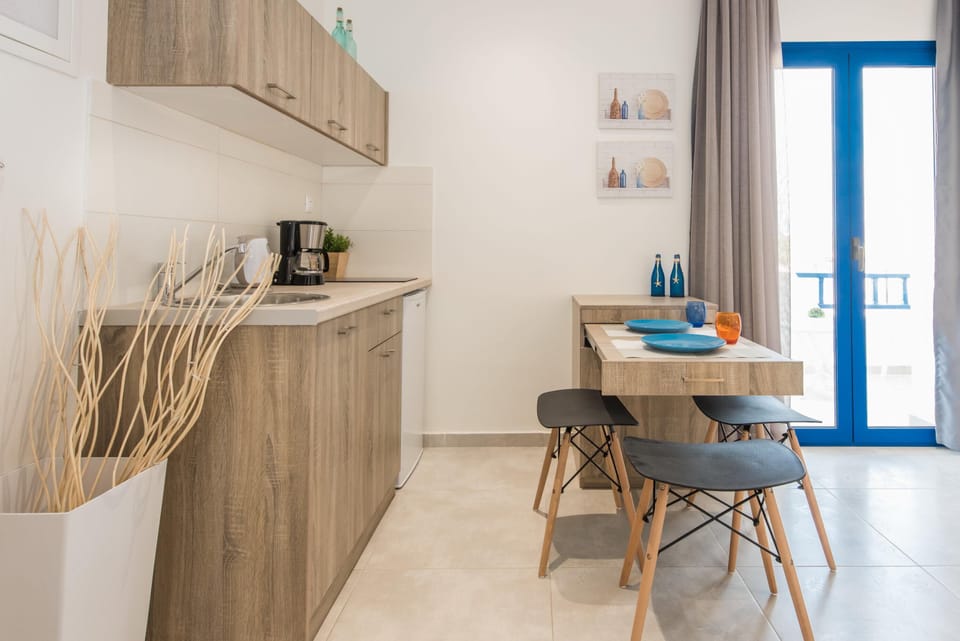 Superior Apartment, Partial Sea View | Private kitchen | Fridge, stovetop, toaster, cookware/dishes/utensils