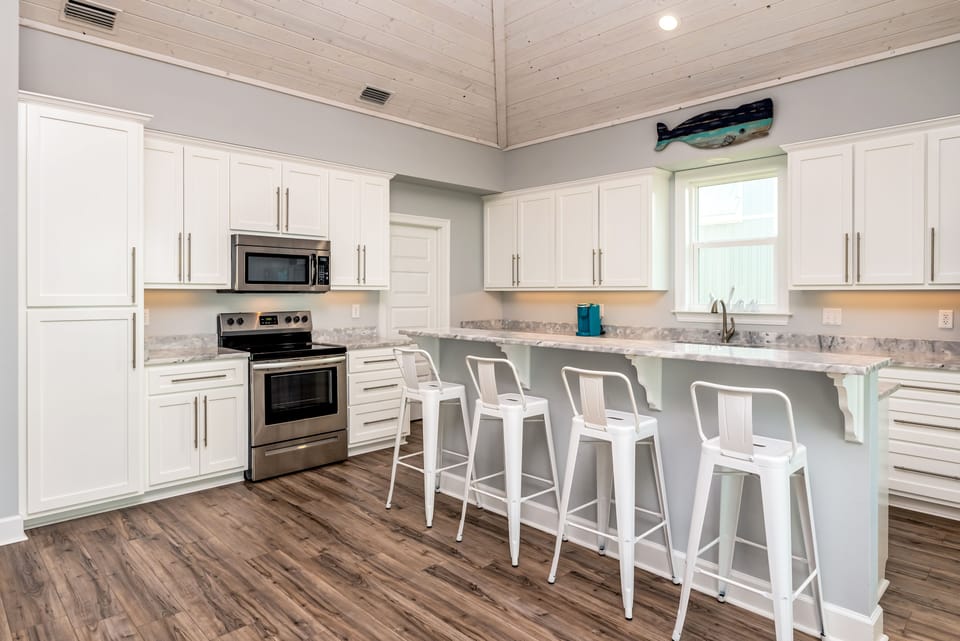 tons of cabinet space, bright and large room. Beach views