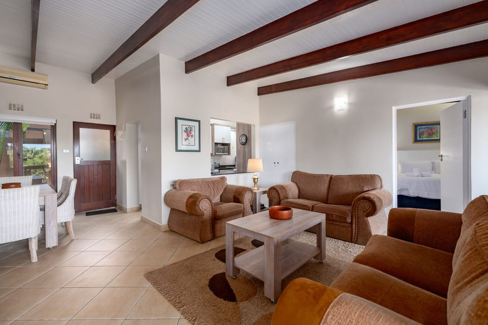 Superior Villa | Living area | Flat-screen TV