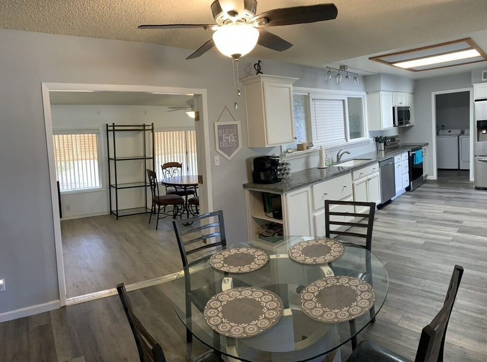 Dining area viewing kitchen and Arizona Room
