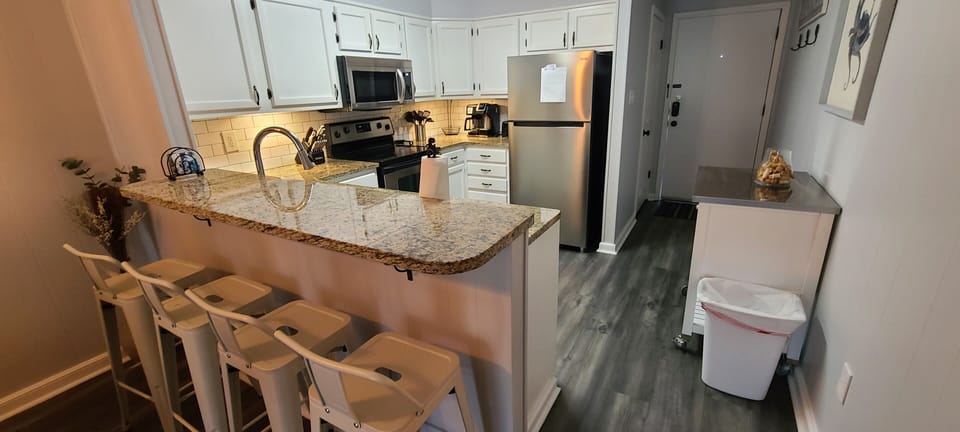 Stainless appliances and a bonus island for storage.