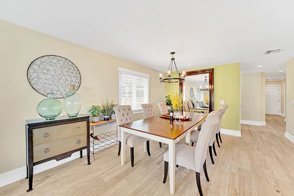 The dining table includes seating for 6-8.
                
