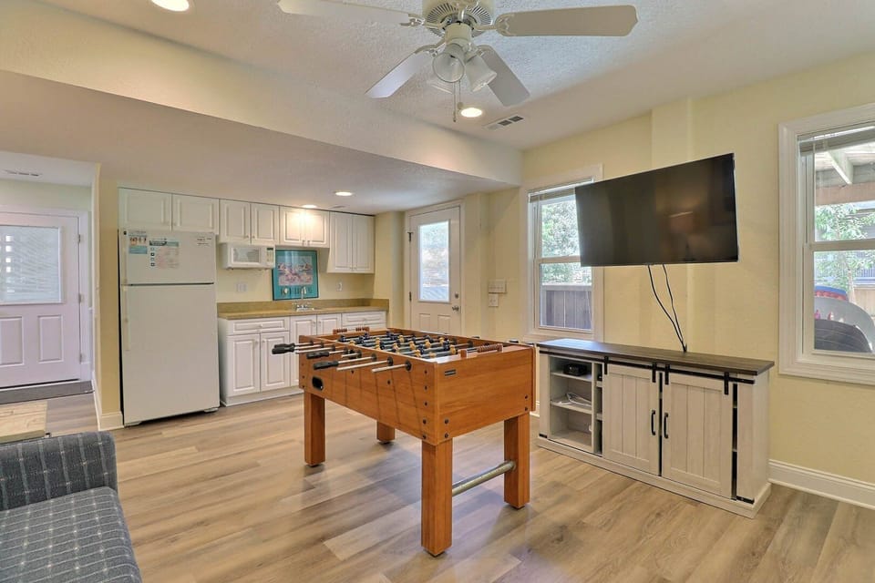 Let off some steam in the Game Room with a Wet Bar!
