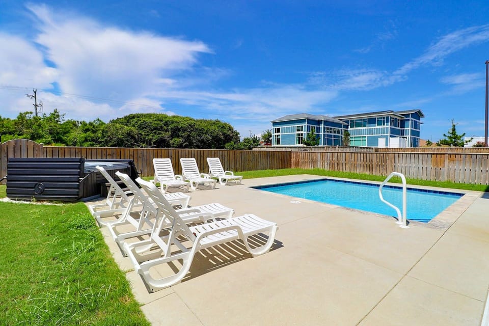 Pool Deck: Sun-soaked poolside space with room to relax and lounge