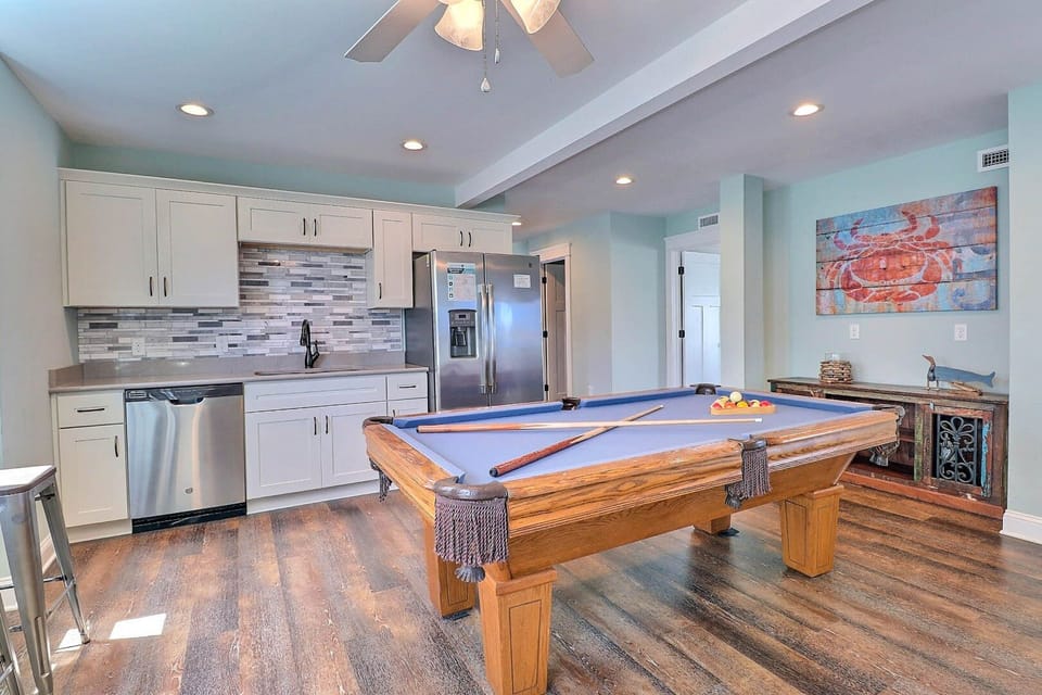 Rec Room: Spacious game room with pool table and entertainment seating
